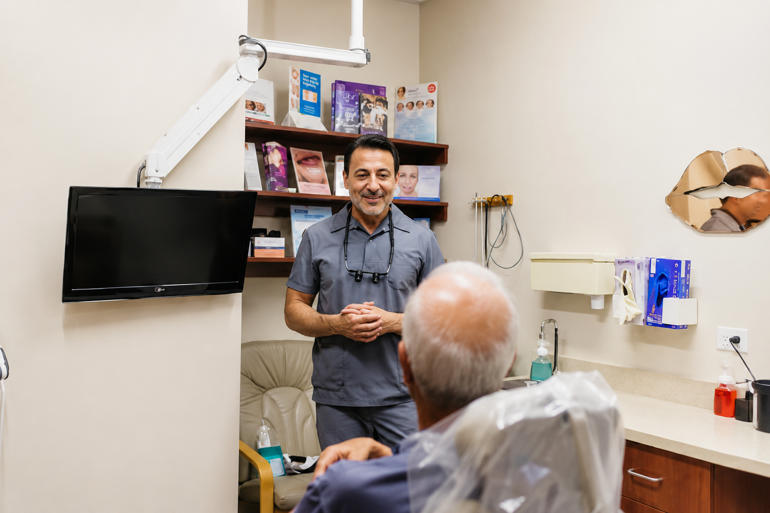 Dr. Sokol speaking with a dental implant patient